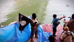 ISIS use child 10 to execute prisoners